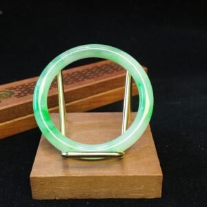 Clear‑Mountain Green‑Shadow Jadeite Bangle